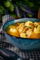 Barley soup with vegetables and chicken.
