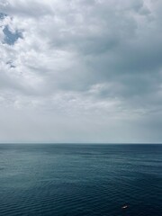 Naklejka na ściany i meble Cloudy ocean horizon, seascape background