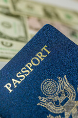 United States passport with dollar bills