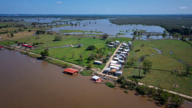 Aerial view of the BR 319 highway linking Manaus and Porto Velho in the Brazilian Amazon. The beginning of the route in Careiro da V&aacute;rzea is surrounded by wetlands and rainforest. Amazonas, Brazil
