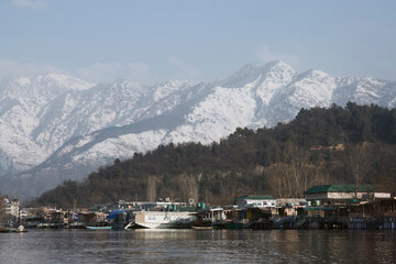 Srinagar, Jammu and Kashmir /  India - December 17, 2019 : A view of the Dal lake, and the...