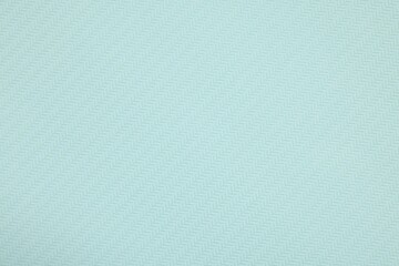 Stylish light turquoise wallpaper as background, closeup