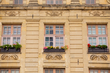Obraz premium Closeup of a facade of an old building in Arras, France