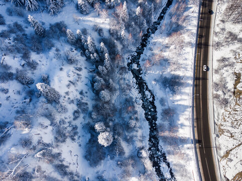 The road to the Medeu tract in winter. Bird's eye view after heavy snowfall