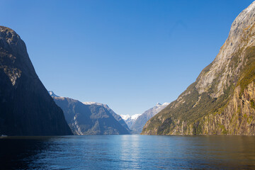 snowy mountain in the background of mild ford sound