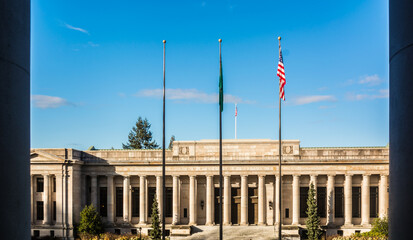 Washington State Temple of Justice Supreme Court law library flags front south from capitol building