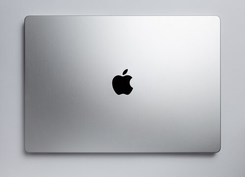 Close-up top view of Macbook grey laptop by Apple. Mackbook Pro 16  M1 chip 2021