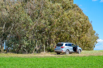 Suv parked in the countryside - 744155768