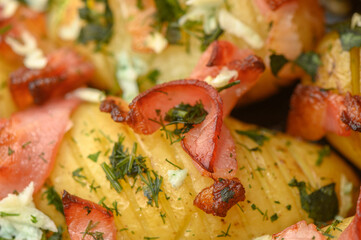 baked potatoes with bacon in the kitchen 10