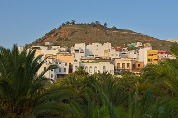 View of houses on the slope of the mountain in Arucas, Gran Canaria, Spain