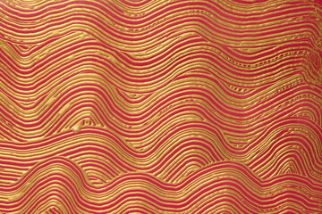 Abstract red, gold bronze color acrylic wave painting stucco wall. Canvas vintage grunge texture...