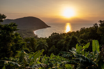 Guadeloupe, a Caribbean island in the French Antilles. View of Grande Anse beach. Beautiful view of the natural bay and sea at sunset. Landscape shot of a tropical dream