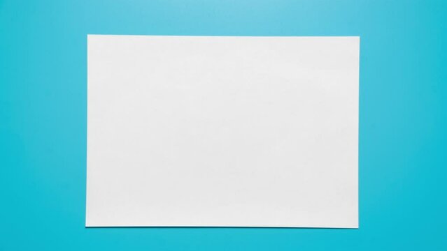 Stop motion animation of crumpled paper on a blue background. High quality 4k footage