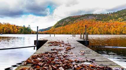 Lac-du-missionaire, Canada: Oct.10 2022: Morning fog on the lake of Lac-du-missionaire with...