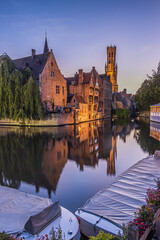 Rosary Quay in Bruges for an evening atmosphere. Famous old town belfry and historic guild houses...