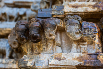 Carvings on ancient Hindu temple - 744187704