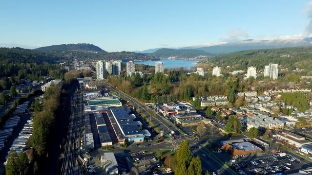 Burrard Inlet Seen From Port Moody In British Columbia, Canada. aerial pullback shot