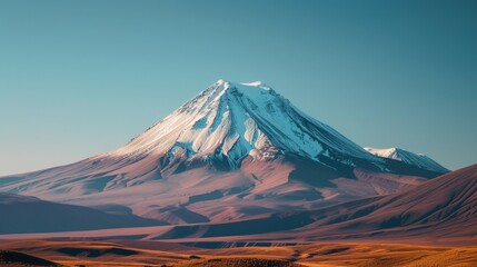 The majestic araate mountain, with its snow-capped summit and rugged ridge, stands tall against the vast sky, a striking blend of nature's beauty and the powerful force of an extinct stratovolcano - obrazy, fototapety, plakaty