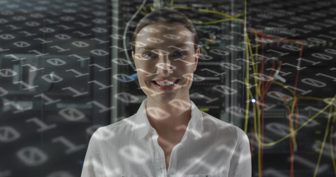 Image of binary coding over caucasian female it engineer with tablet checking computer servers - Powered by Adobe