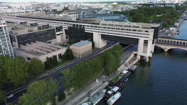 Ministry of Economics and Finance new palace in Bercy, Paris in France. Aerial backward ascending
