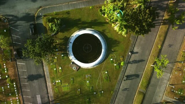 Top down drone shot above the MMP Fountain in Manila memorial park, sunny Philippines
