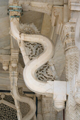 Agra, Uttar Pradesh / India - February 7, 2012 : White marble serpentine brackets of the tomb of the saint Salim Chishti at Jama Masjid in Fatehpur Sikri, Agra. © Shyamal
