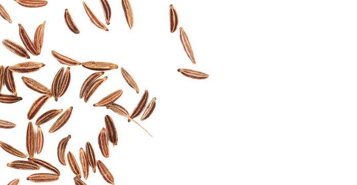 Close up cumin pile isolated on white, top view, macro