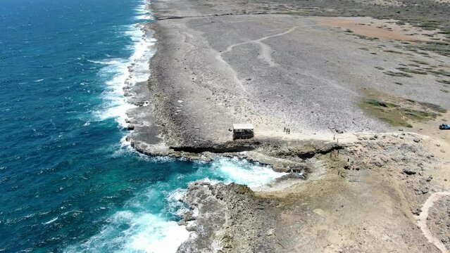 Shete boka national park with waves crashing on desolate shores, aerial view