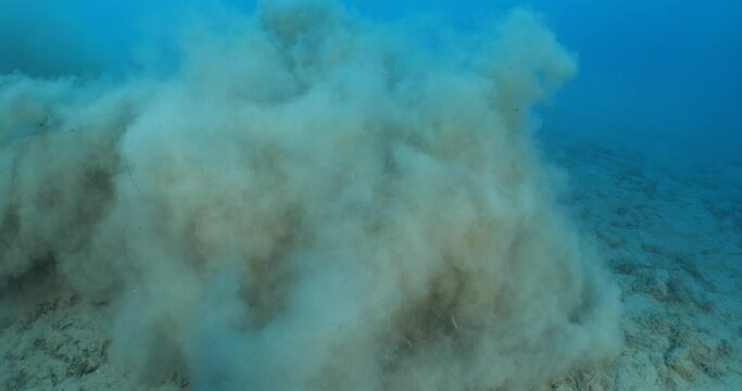 sand underwater moving making shapes  no gravity like sand storms and clouds