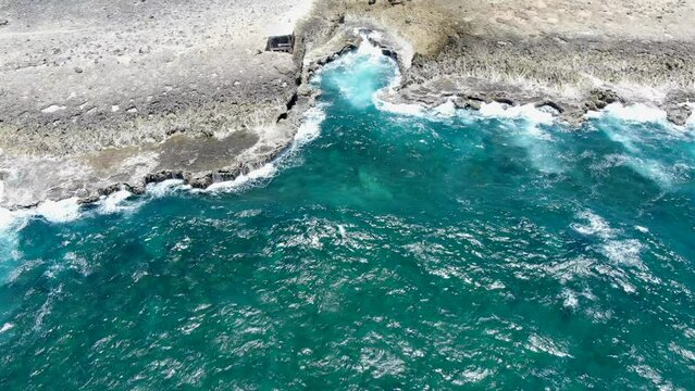 Shete boka national park with waves crashing on rocky shores, aerial view