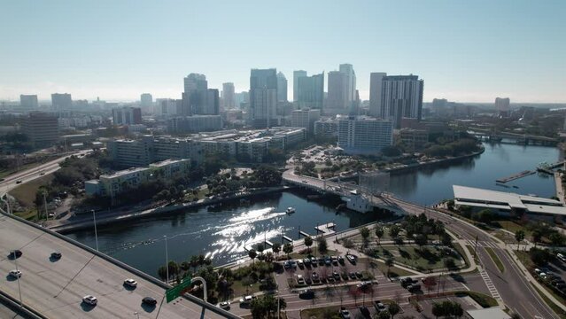 Drone flying into downtown Tampa bay riverwalk area