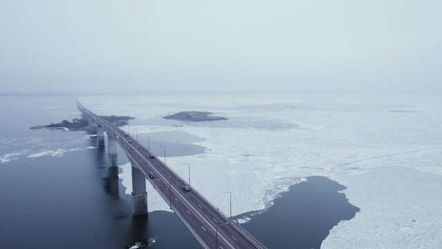 Flying backwards, Oland bridge during the cold winter