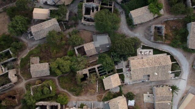 Aerial Slide Top View over Old Perithia Village of Corfu, Greece