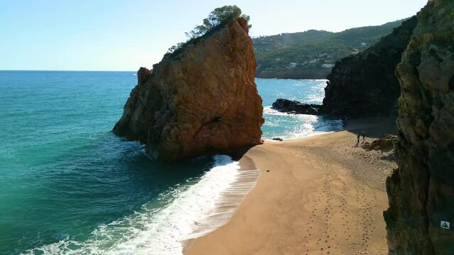 Ilia Roja beach on the Costa Brava of Gerona, rock in the middle of the sea nudist beach , Nature nudist