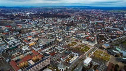 Fototapeta na wymiar Drone aerial view of the city Kassel in Germany. The downtown during a sunny day in late winter 