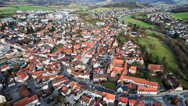 Aerial view around the old town of the city Schlüchtern in Hessen Germany on a sunny day in early spring	