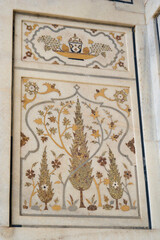 Agra, Uttar Pradesh / India - February 27, 2012 : An inlaid work of color stone on white marble at Itimad-Ud-Daulah in Agra.