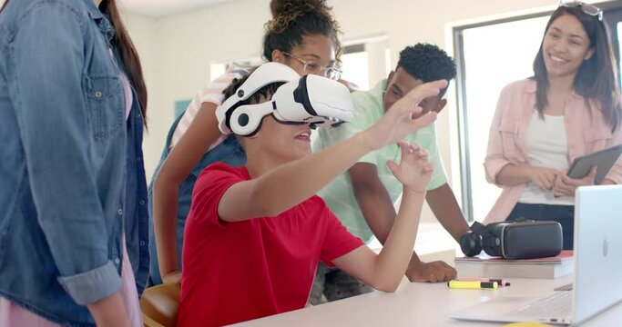 Diverse students engage in a VR experience at high school