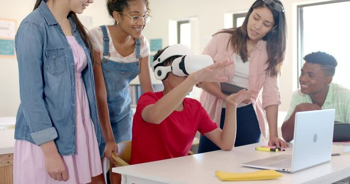 Diverse students explore virtual reality in a high school setting