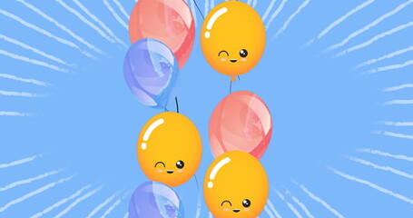 Image of blue and yellow balloons flying over blue background