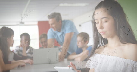 Image of mathematical equations over school children using smartphone and laptop in classroom