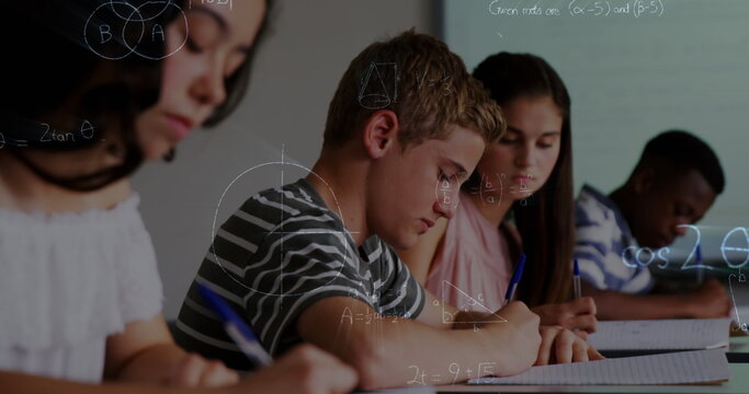 Image of mathematical equations over school children writing in classroom