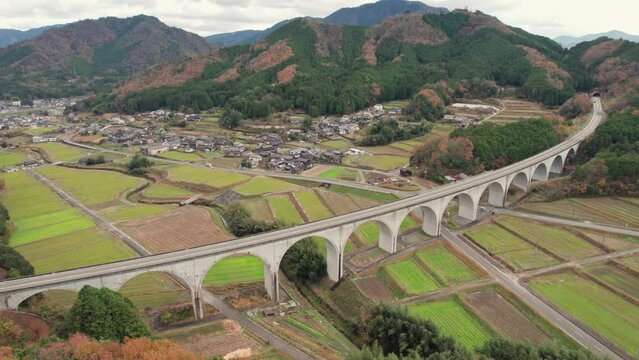 Geometrical Bridge around Japanese Countryside Valley Village Green Natural Aerial Drone Landscape, Takeda Castle, Asago Hyogo Japan