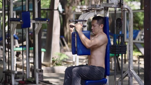 Man exercising his chest with a chest press