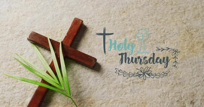 Animation of holy thursday text over christian cross and palm leaf on grey background