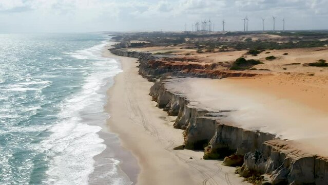 Aerial view of the Morro Branco cliffs and the wind energy, Ceara, Brazil