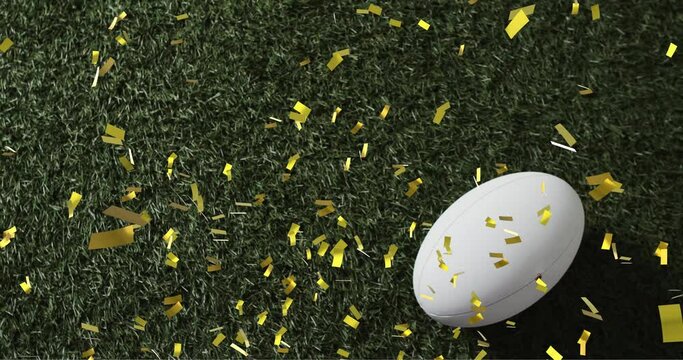 Animation of confetti over white rugby ball on grass