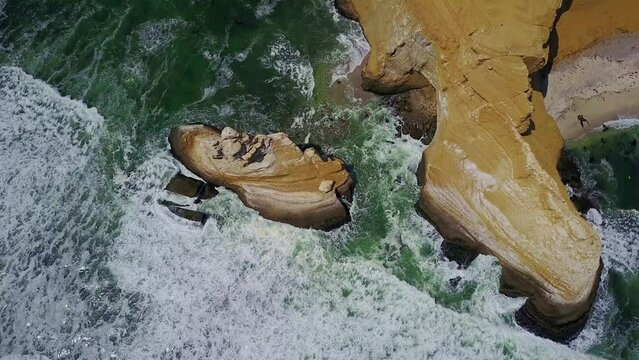 Aerial Drone Rising High Above the Coastal Paracas Cliffs Over La Catedral Rock, Peru, South America.