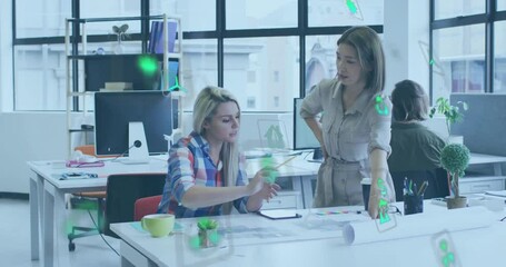 Animation of ecology icons over diverse colleagues discussing work in office - Powered by Adobe