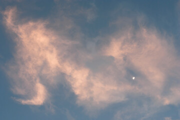 Vadodara, Gujarat / India - June 2, 2010 : A view of the clouds and moon in the sky.